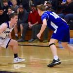 Ethan Germain applies defensive pressure. / John Stimpson photo