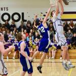 Marshall Clark was on fire, here he lays up another basket one of many. / John Stimpson photo