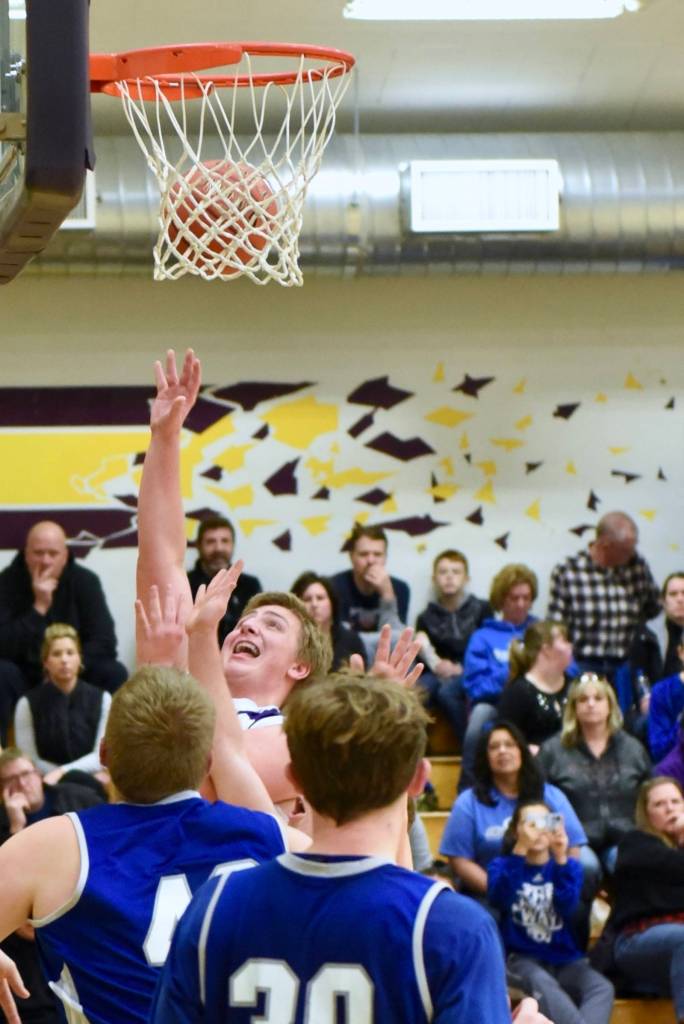 Teagan Big Mac August puts up a two point lay in. / John Stimpson photo
