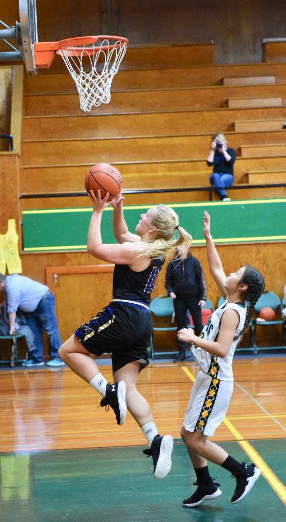 Tori Polda races to the basket for two points. / John Stimpson photo