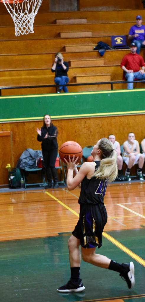 Olivia Germain lays up for two points. / John Stimpson photo