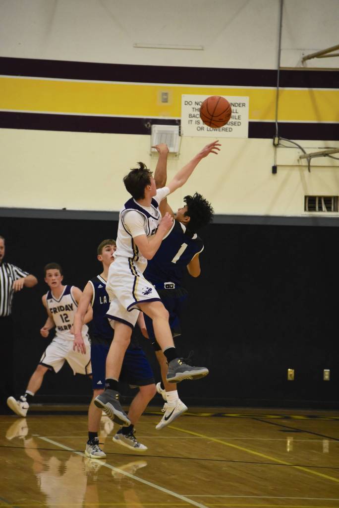 Staff photos/Tate Thomson                                Scenes from FH and LaConner game.