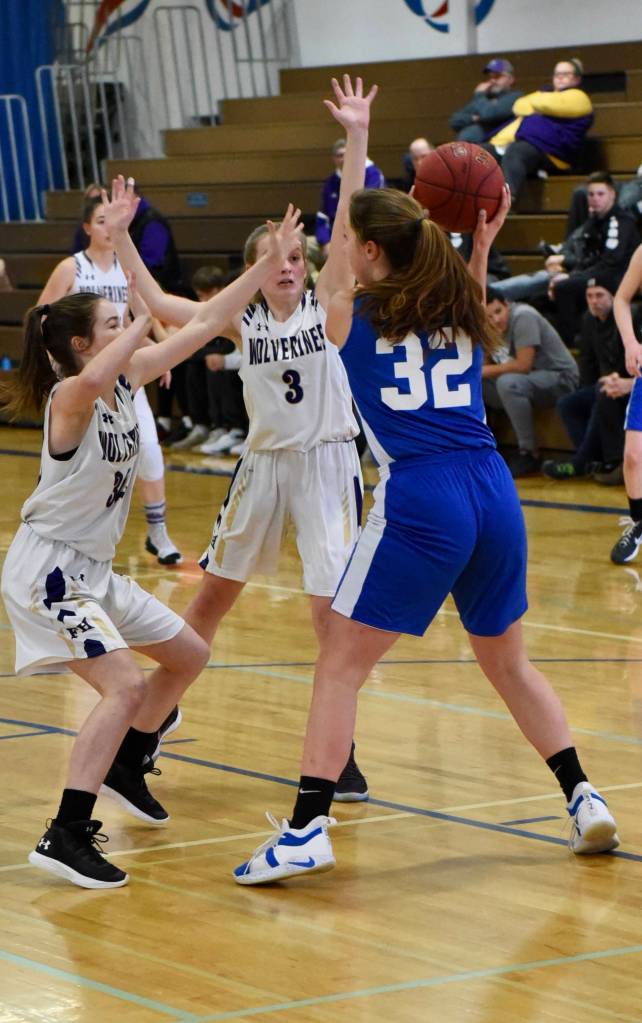 John Stimpson photo / Fallon Taylor and Darcy Ayers apply defensive pressure.