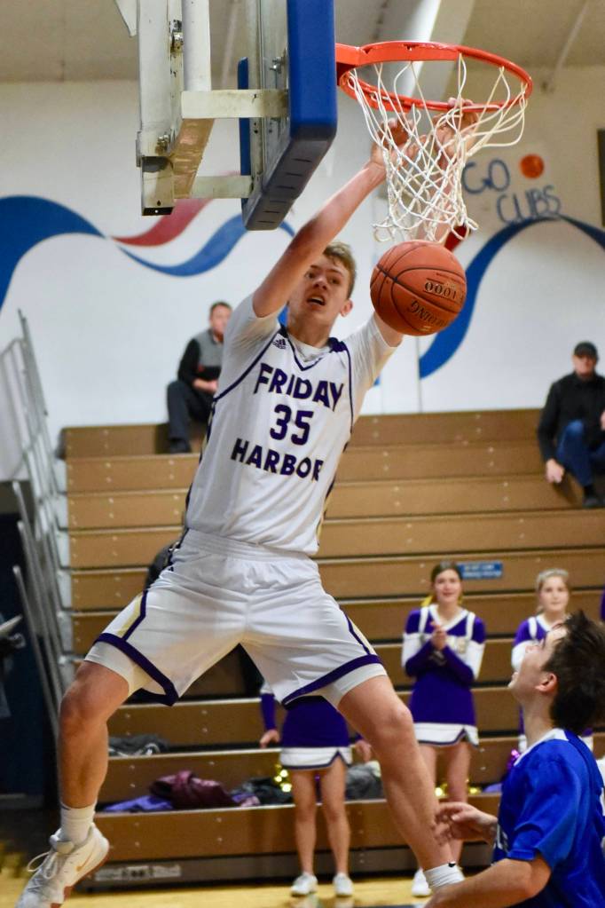John Stimpson photo / Marshall Clark with a slam dunk.