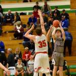 John Stimpson photo / Chase Wilson shoots a 3-pointer from the corner.