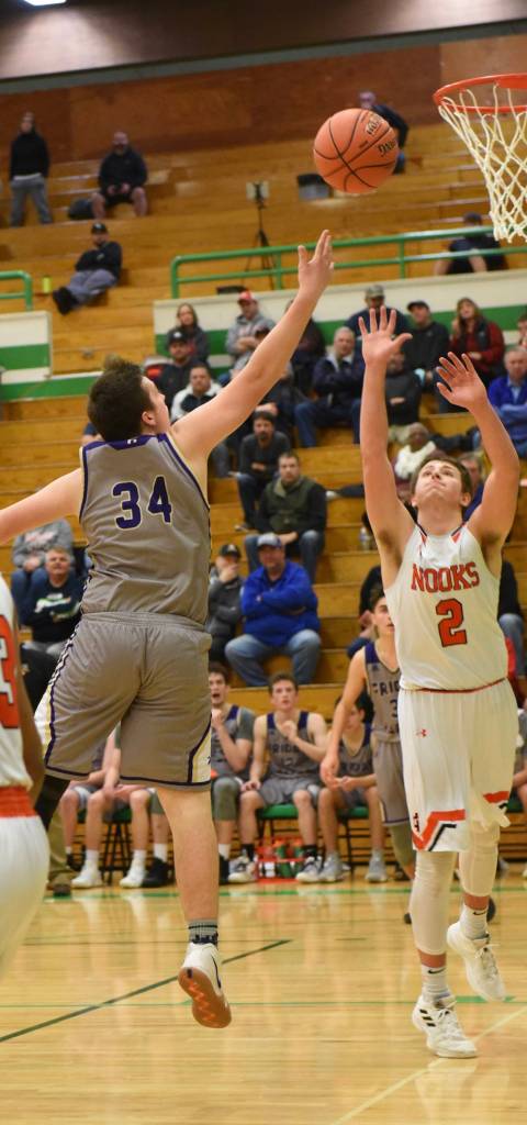 John Stimpson photo / Gavin Mason puts up a two point shot.