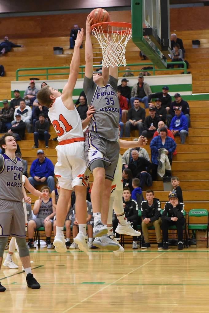 John Stimpson photo / Marshall Clark got in a slam dunk to ignite the Wolverine fans.