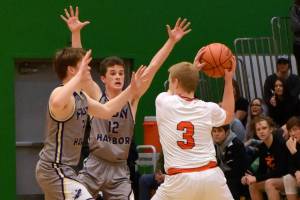 John Stimpson photo/ Chase Wilson and Ethan Germain apply defensive pressure.