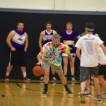 High school staff battle seniors on the court
