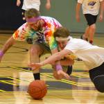 High school staff battle seniors on the court