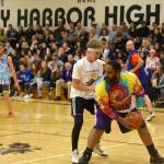 High school staff battle seniors on the court