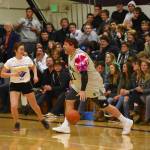 High school staff battle seniors on the court