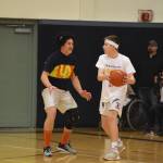 High school staff battle seniors on the court
