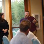 Staff photo/Tate Thomson                                Linnea Anderson and Carl Marino answer questions from meeting attendees.