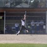 Staff photo/Tate Thomson                                Pitcher Grace Pauls throws ball to Jayna Ott on first.