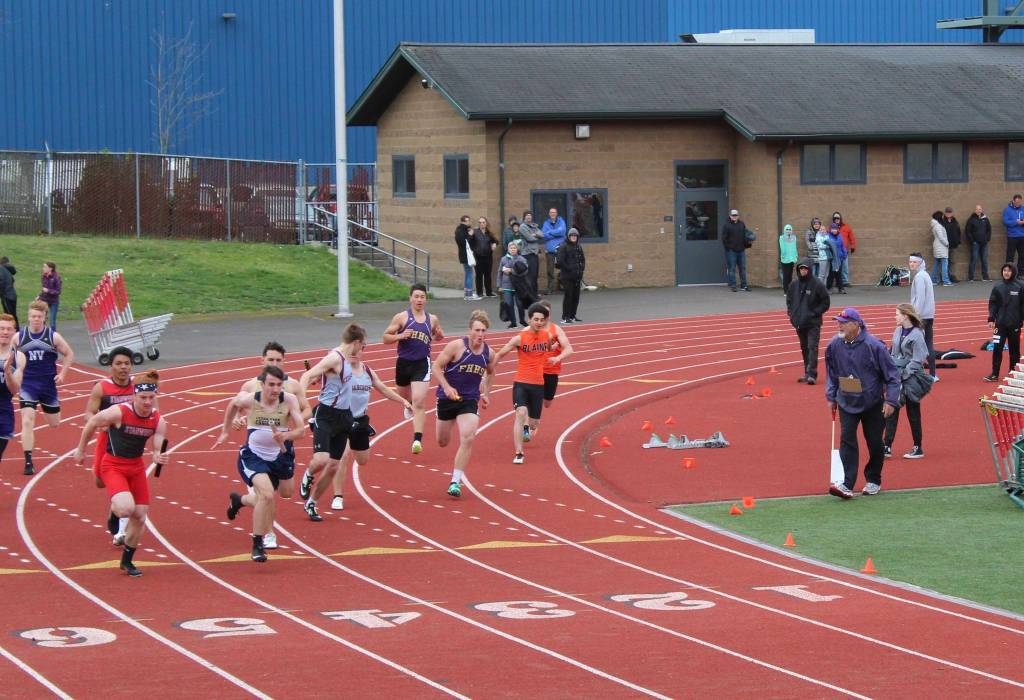 Contributed photo/Lee Ann Russell                                Mens 4x100 Relay Kaden Ritchie handing off to Emeron Geiger