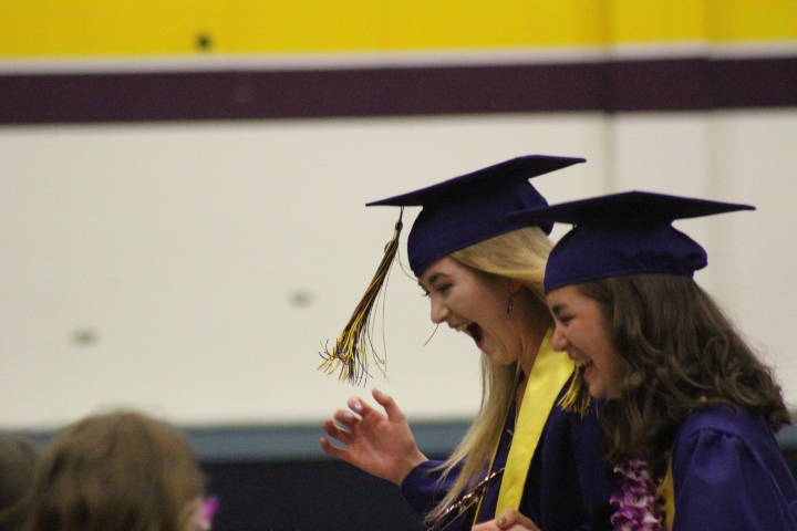 Friday Harbor Graduates throw their caps