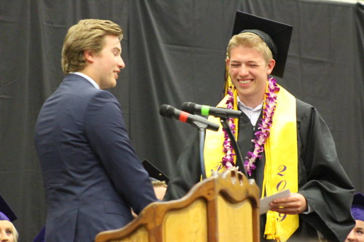 Friday Harbor Graduates throw their caps