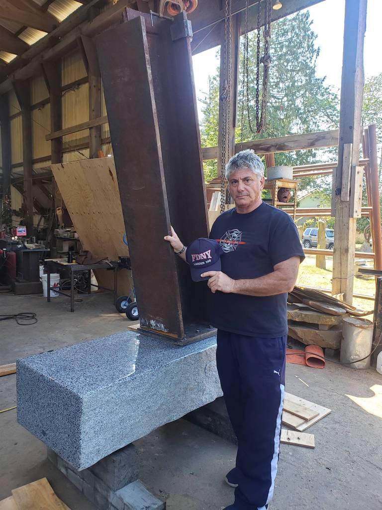Ron Parker on Orcas Island during the first fitting of the structural beam from the fallen towers of 9/11 earlier in September