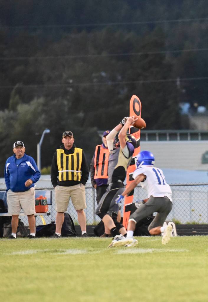 Wolverine Jordan Lawson, number 14 catches a pass and hangs on for needed yardage. <em>(John Stimpson/contributed photo)</em>