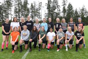 Front row (left to right): Fionnoula Bourne, Katie Place, Olivia Brown, Fallon Taylor, Ahyram Orozco, Ella Raichlen, McKenna Clark and Emilie Mason. Back row (left to right): Audrey Allen, Alex Holman, Lucy Martin, Bailee Lambright, Ellie Perkins, Ally Pauls, Joanna Evans, Betty Furber, Sofia Duke, Jenny Garfias and Sage Penwell. Not pictured: Ivonne Plaza, Sheya Welty, Lucy Marinkovich, Meg Carrier, Ari Tucker-Belt, head coach Paul Hopkins and Assistant coaches Kevin Cullen, Robert Pauls, Doug Maya and Tara Plank. <em>(Tate Thomson/staff photo)</em>