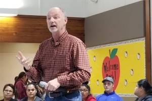 Lopez Island School Board Chairman John Helding speaks to a full room during the Sept. 25 school board meeting <em>(Mandi Johnson/staff photo)</em>