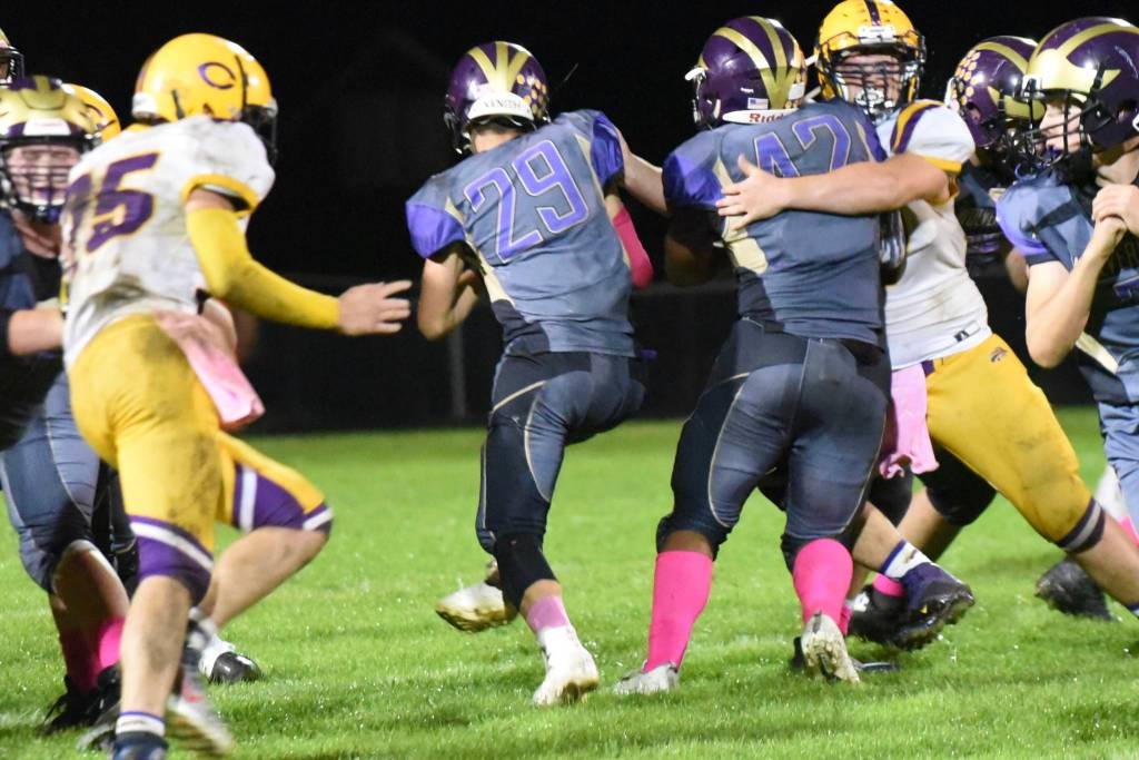 Connor Haines, No. 29, runs up the middle for good yardage. (John Stimpson/Contributed photo)