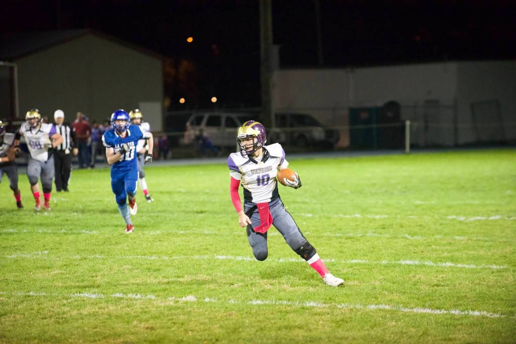 Jaden Jones, No. 10, takes off upfield after catching a pass giving the Wolverines a first down. (John Stimpson/Contributed photo)