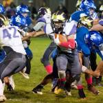 Kyson Jackson, No. 22, busts through the line on a good yardage gain. (John Stimpson/Contributed photo)