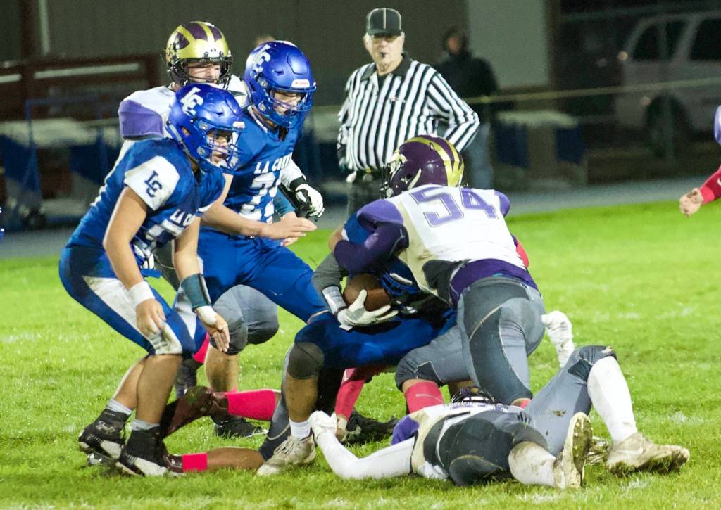 Gavin Mason, No. 54, puts the stop on the Braves running back. (John Stimpson/Contributed photo)