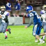 Dylan Roberson, No. 7, throws a pass under pressure from the Braves. (John Stimpson/Contributed photo)