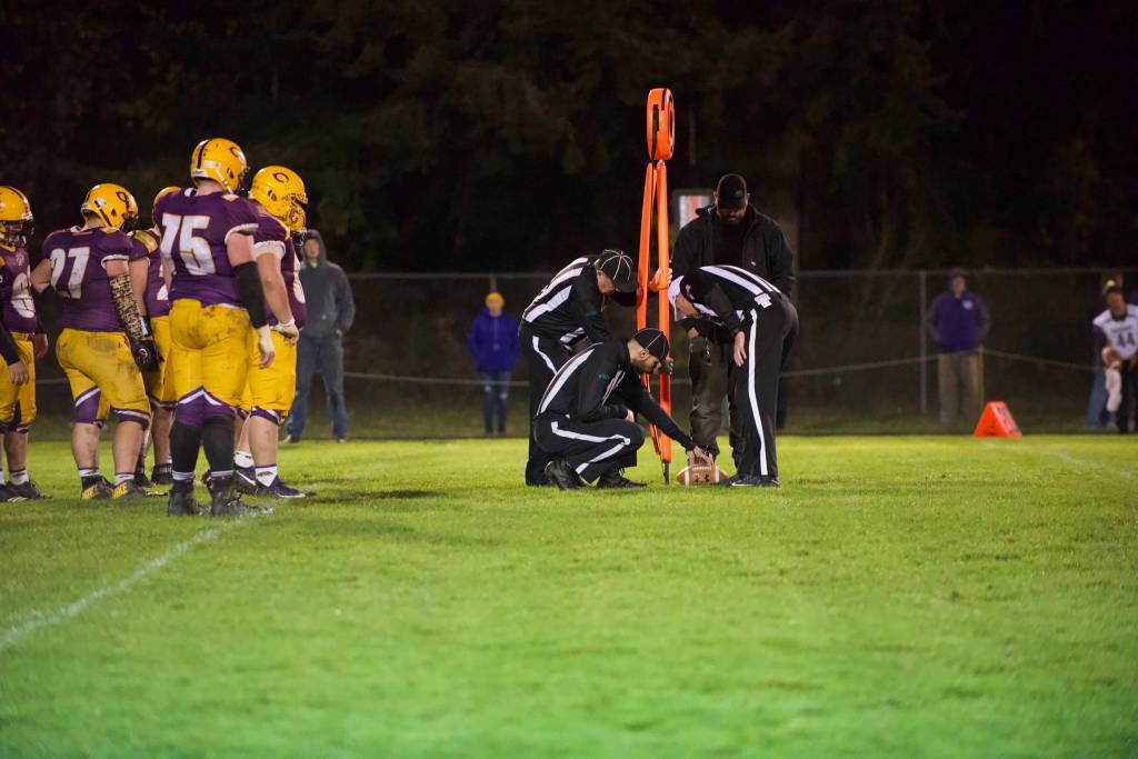 Officials check to see if the Wolverines got a first down next play the got it! (John Stimpson/Contributed photo)