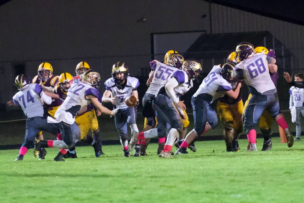 Quarterback Dylan Roberson, No. 7, hands off to Kyson Jackson, No. 22, who plows in for a touchdown! (John Stimpson/Contributed photo)
