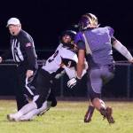 Austin Wynne, No. 55, closes in for the tackle of a Tigers ball carrier. (John Stimpson/contributed photo)