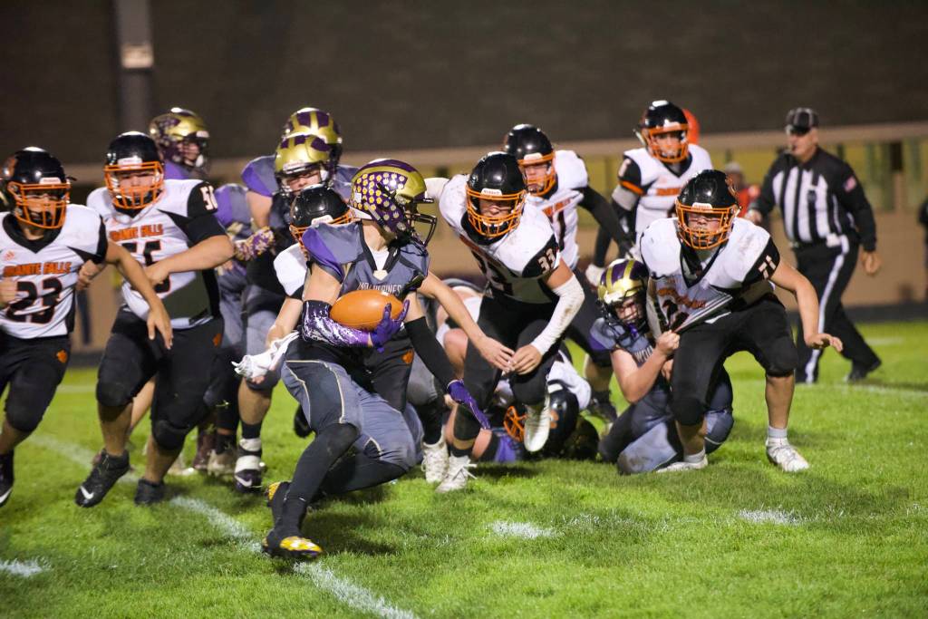 Wolverines Kyson Jackson, No. 22, outruns the Tigers team to the goal line. (John Stimpson/contributed photo)