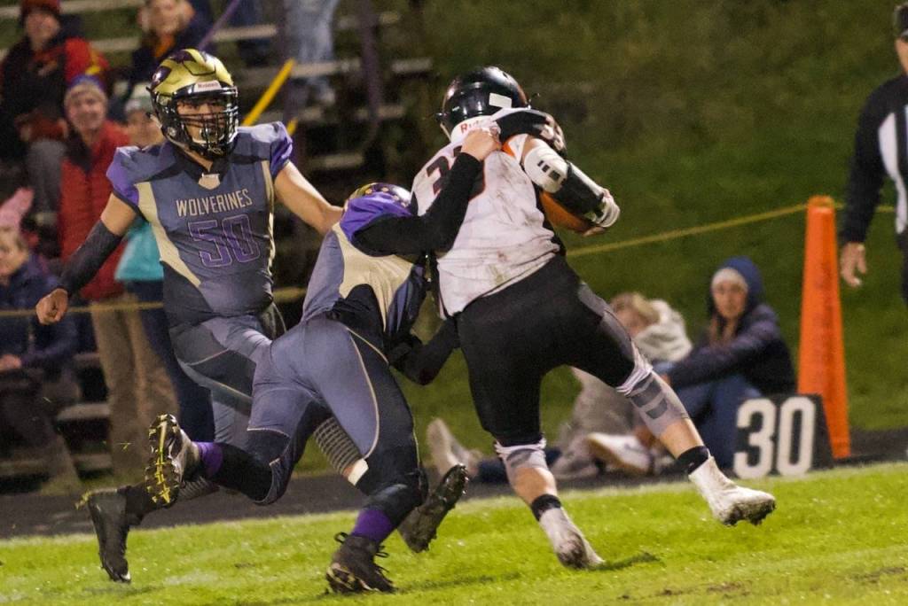 Dylan Roberson, No. 7, brings down the Tigers ball carrier. (John Stimpson/contributed photo)