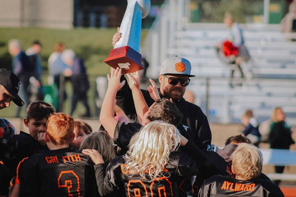 Jenni Staudt/Contributed photo.                                The youngest of the Friday Harbor Tiger Football teams won their league championship game against Darrington on Saturday, Nov. 2 at Lakewood High School. The team of first, second and third graders is coached by Sean Griffith, Andy Flierl, Tom Buchanan and Bryan Jackson.