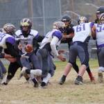 #29 Connor Haines gets the handoff from Quarterback #7 Dylan Roberson for his run up the middle. (John Stimpson/Contributed photo.)