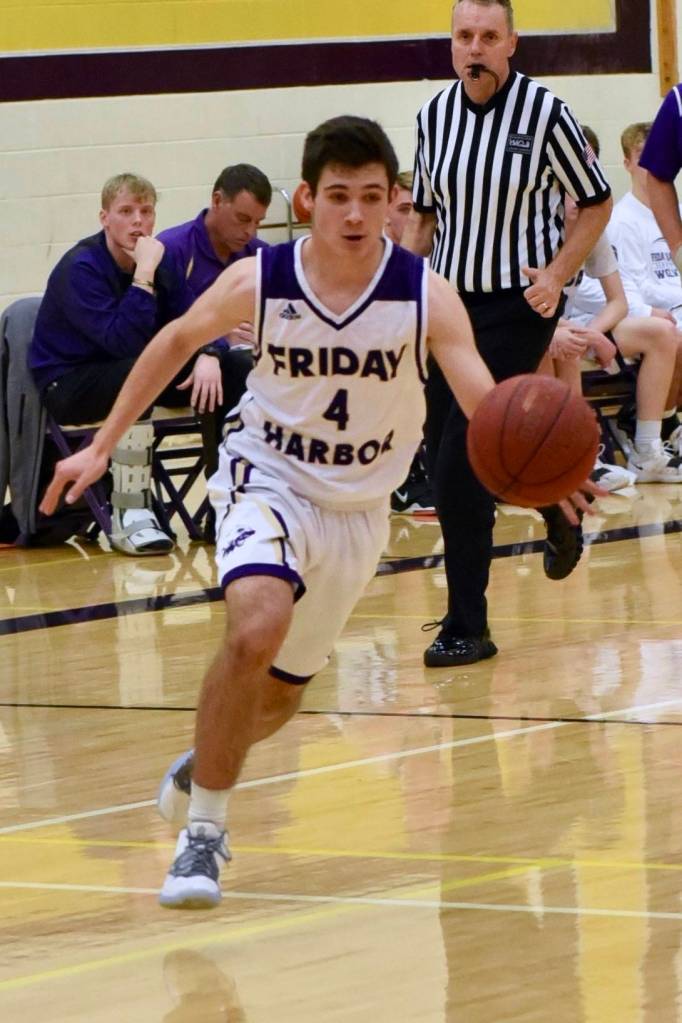 Ty Anderson, No. 4, drives toward the basket. (John Stimpson/contributed photo)