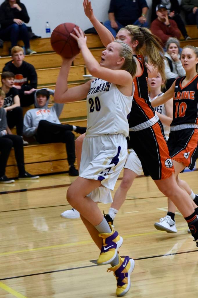 Ashley Lawson, No. 20, drives for a two-point layup. (John Stimpson/contributed photo)