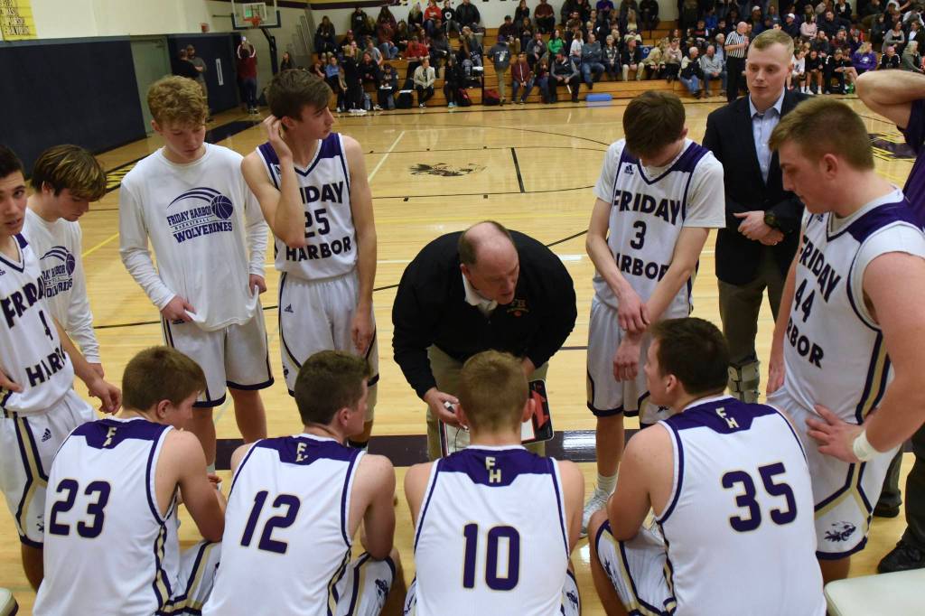 Head Coach Rod Turnbull talks strategy to his players. (John Stimpson/contributed photo)