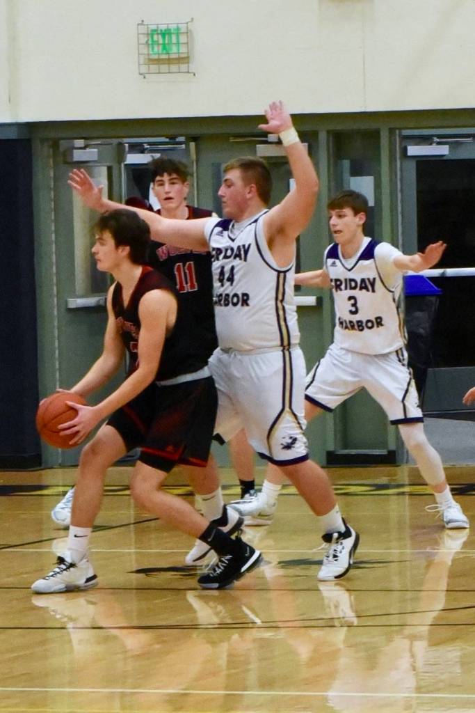 Brothers Teagan and Remy August apply heavy defensive pressure against the Wolves. (John Stimpson/contributed photo)