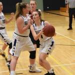 Ella Mason blocks Wolves defender allowing Fallon Taylor to drive to the basket. (John Stimpson/contributed photo)
