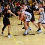 Gavin Mason secures a rebound from the Wolves. (John Stimpson/contributed photo)