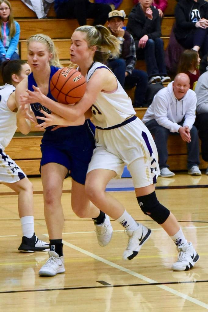 Bailee Lambright steals the ball from the Hurricanes. (John Stimpson contributed photo.)