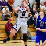 JJ Jones launches up to capture 2 points. (John Stimpson contributed photo.)