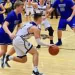 Kyson Jackson drives in toward the basket. (John Stimpson contributed photo.)