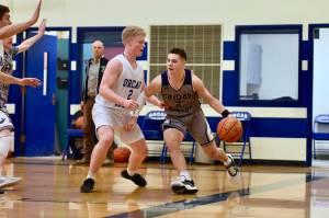 Kyson Jackson drives the base line to the basket. (John Stimpson/Contributed photo)