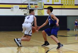 Kyson Jackson begins his drive to the basket. (John Stimpson/contributed photo)