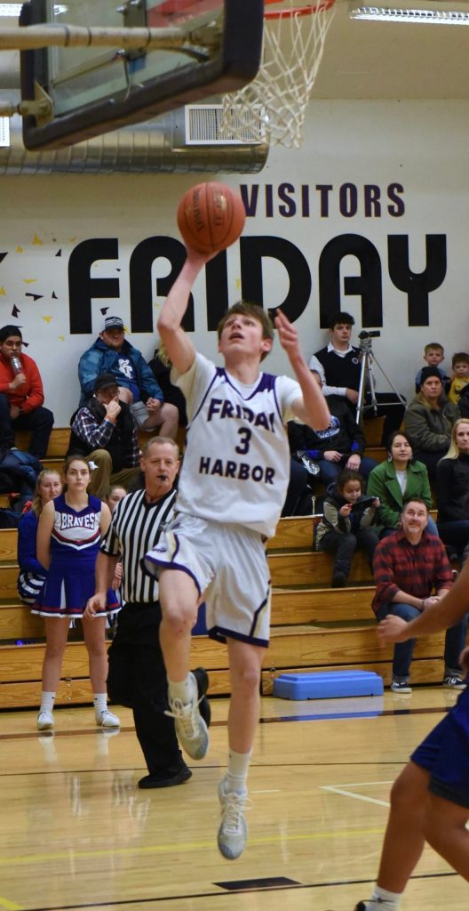 Remy August glides up to a two-point lay in. (John Stimpson/contributed photo)